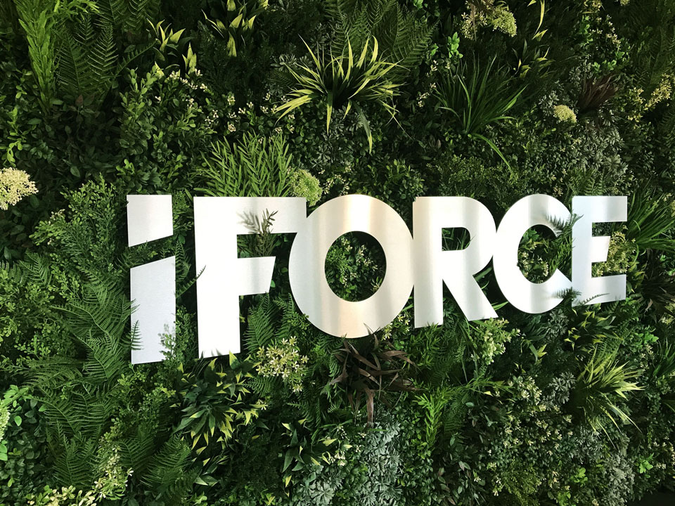 iForce branded green wall